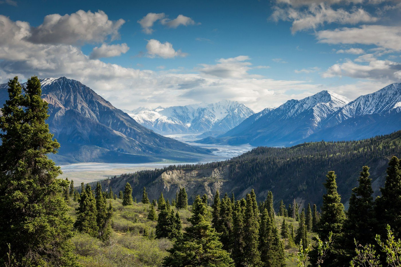 Dramatic mountain peaks beneath a blue sky